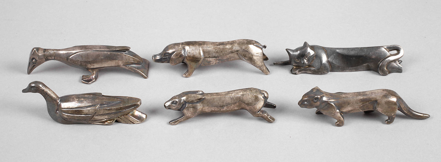 Sechs Messerbänkchen Art déco