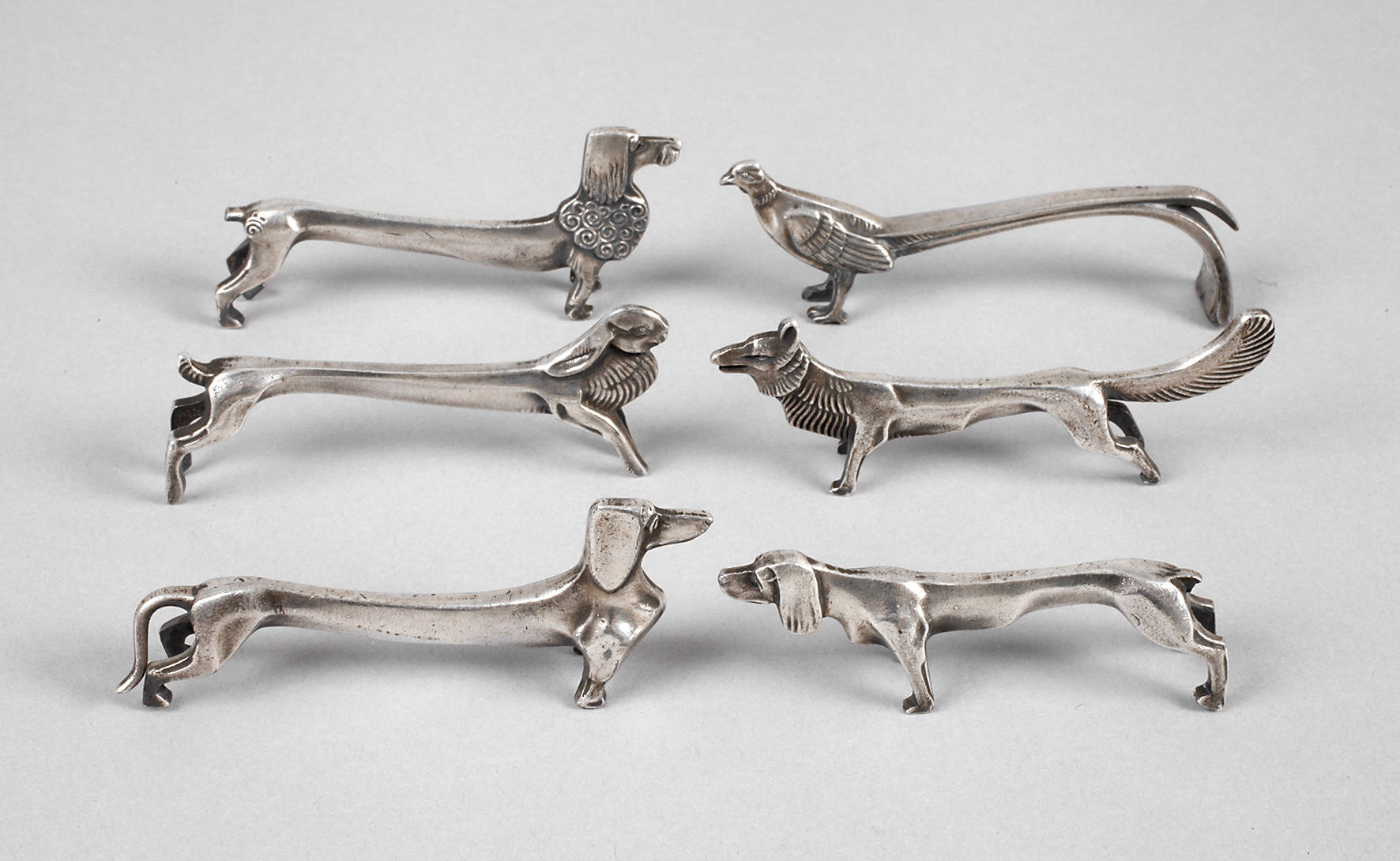 Sechs Messerbänkchen Art déco