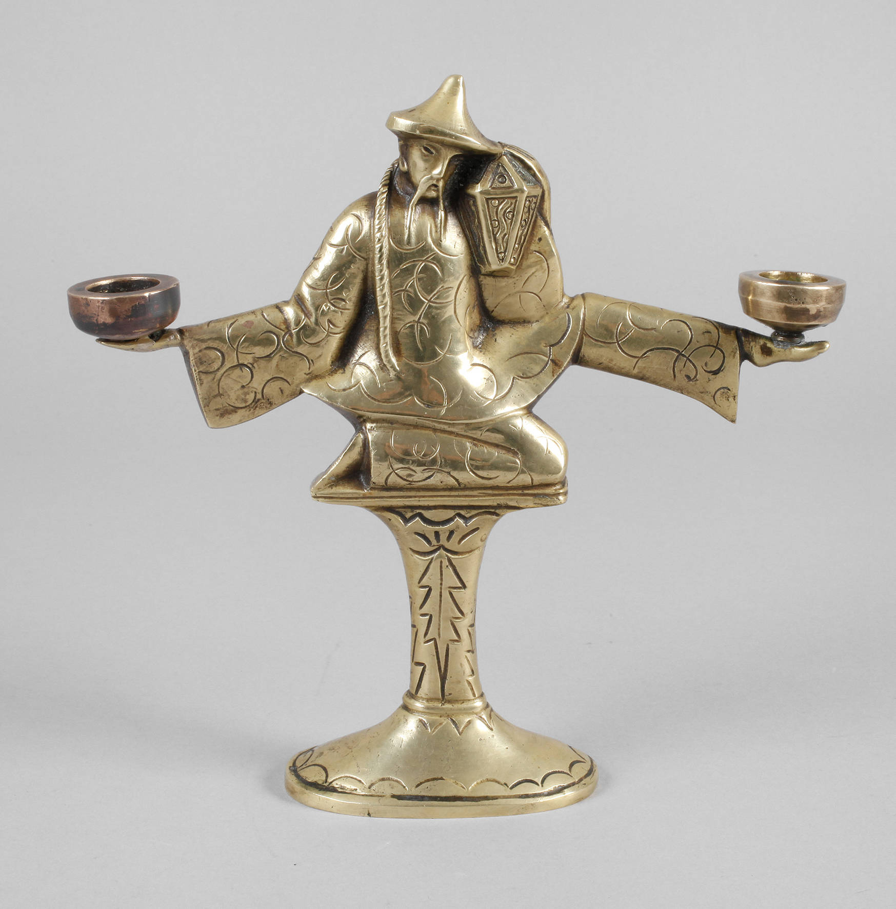 Figürlicher Kerzenleuchter