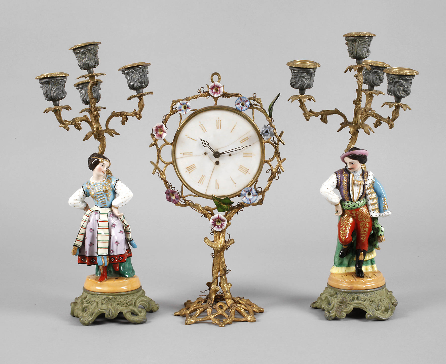 Paar Figurenleuchter mit Uhr