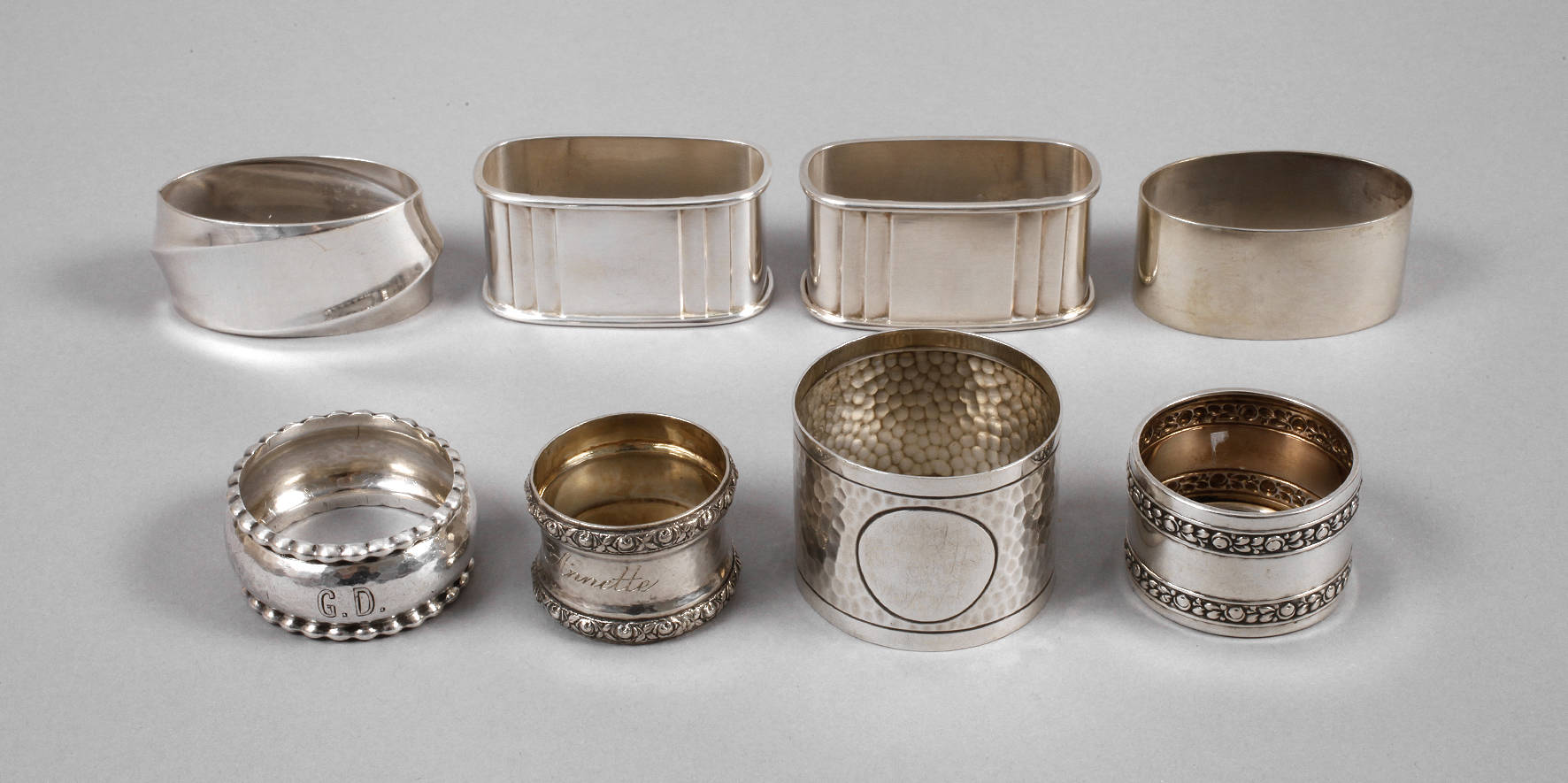 Acht Serviettenringe Silber