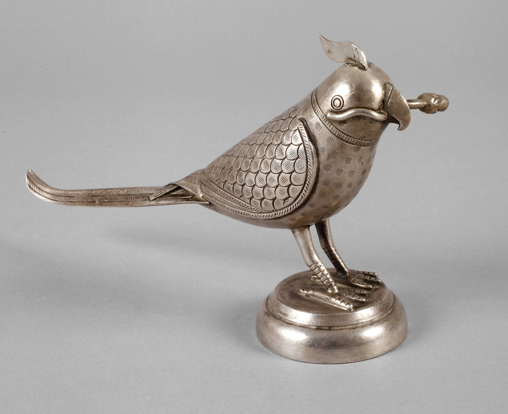 Silbervogel als Schnapsbehälter