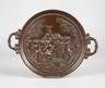 Bronzeteller mit Putten