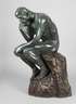 Große Bronzefigur, ”Der Denker”