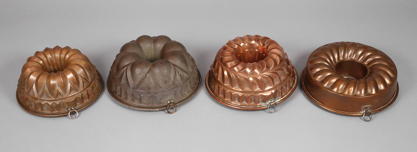 Vier Kupferbackformen