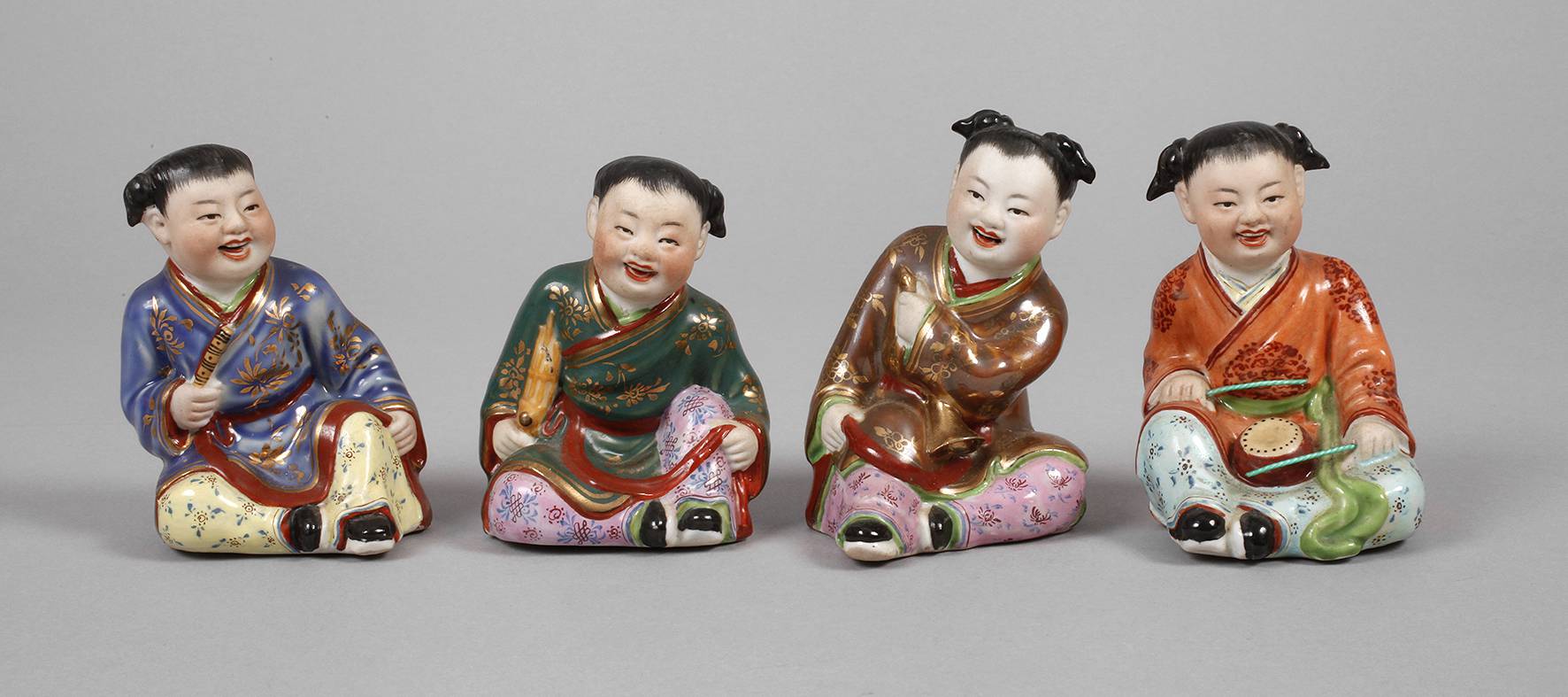 Vier Porzellanfiguren