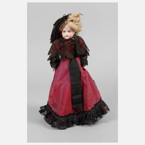 Kleine Porzellankopfpuppe