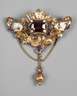 Brosche mit Steinbesatz und Emaille