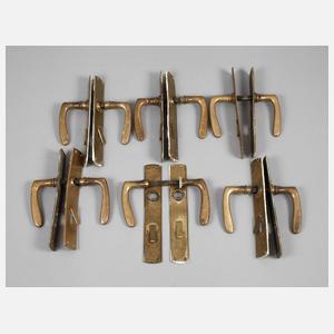 Sechs Drückergarnituren mit Blenden