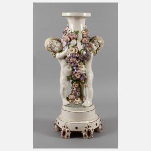 Übergroße Blumensäule mit Putten Bernhard Bloch