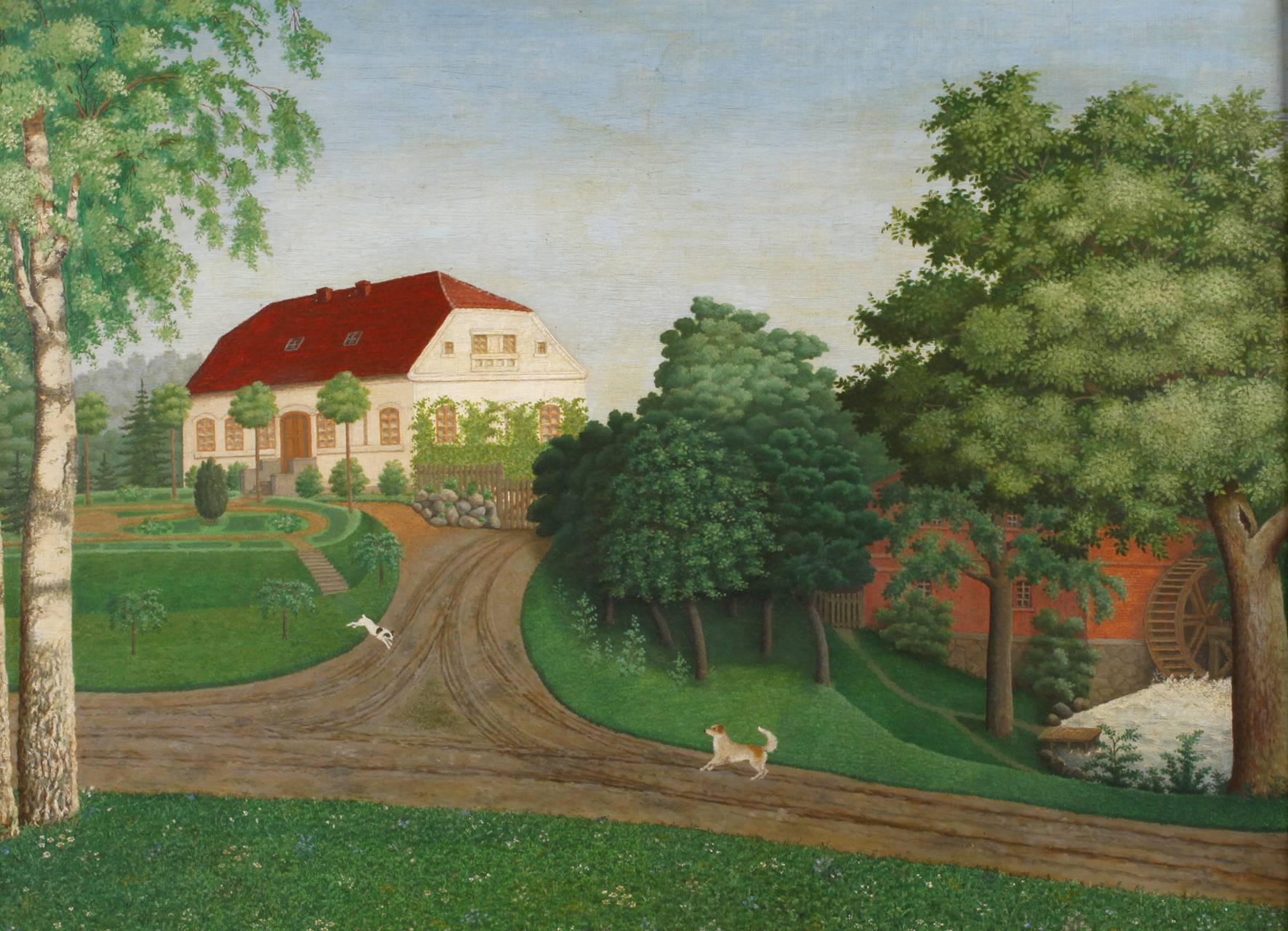 Landhaus mit spielenden Hunden