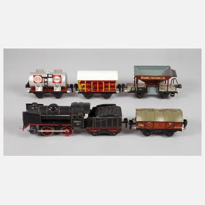 Lok Märklin mit Tender und vier Güterwagen