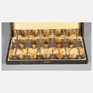 Zwölf Messerbänkchen Art déco