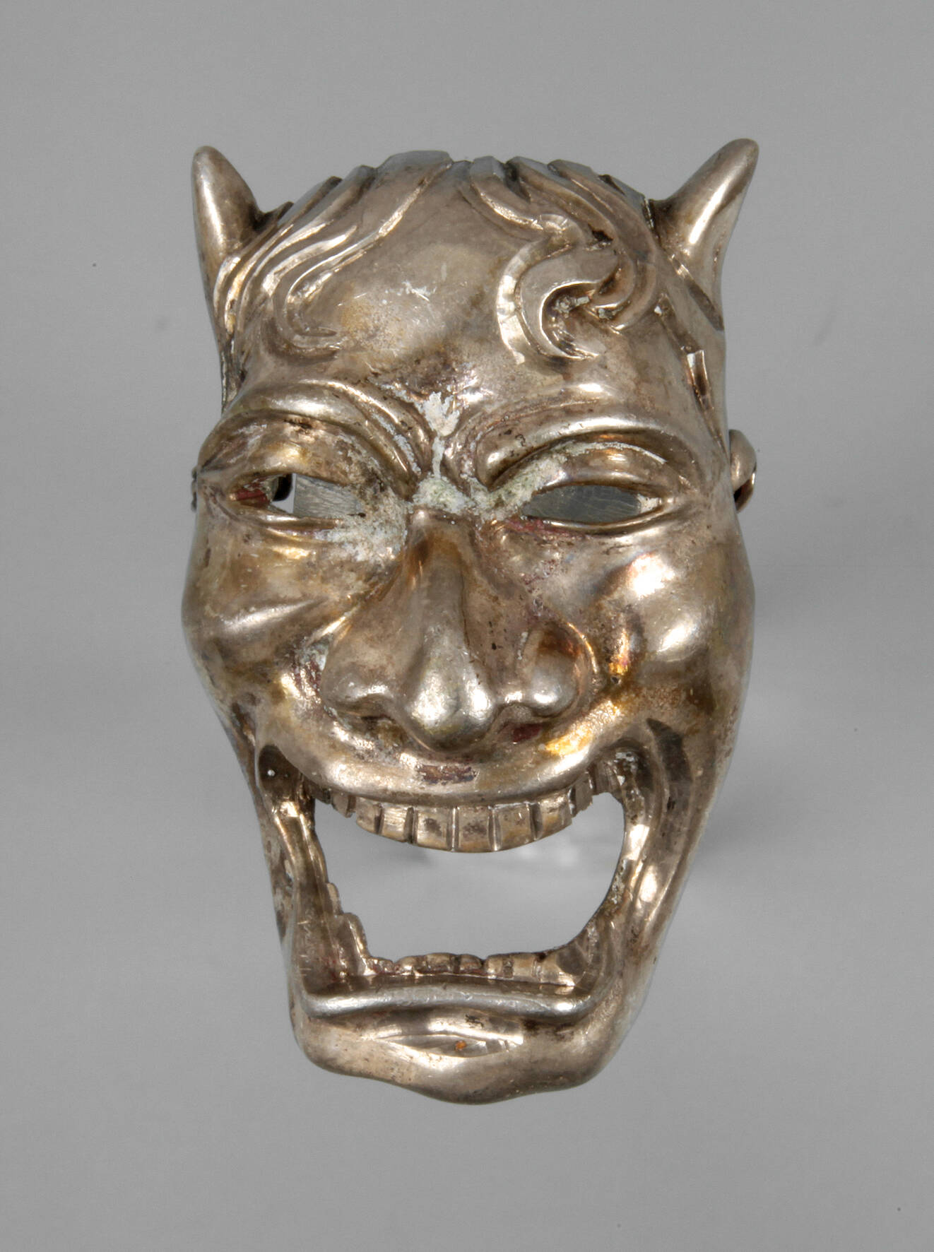 Brosche als Faunkopf