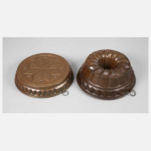 Zwei Kupferbackformen