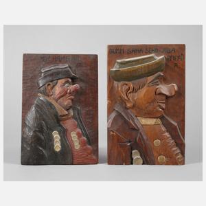 Zwei geschnitzte Wandreliefs