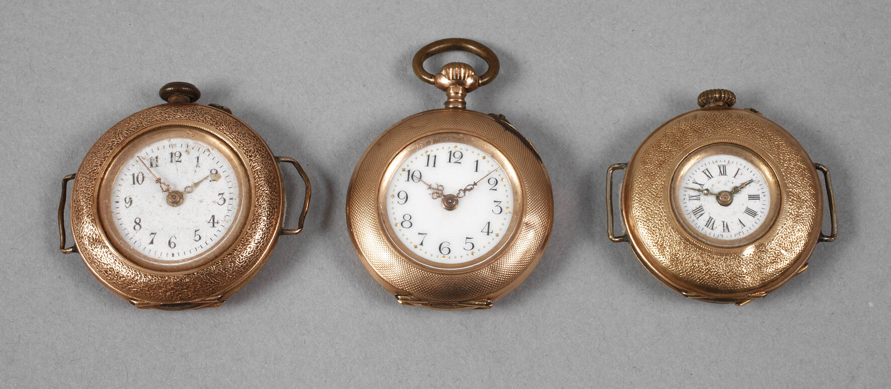 Drei Damenuhren Gold