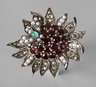 Silberbrosche mit Steinbesatz