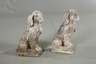 Steinguss zwei Hunde