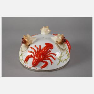 Hummerschale auf Muschelfüßen