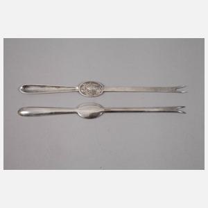 Zwölf Hummergabeln im Kasten