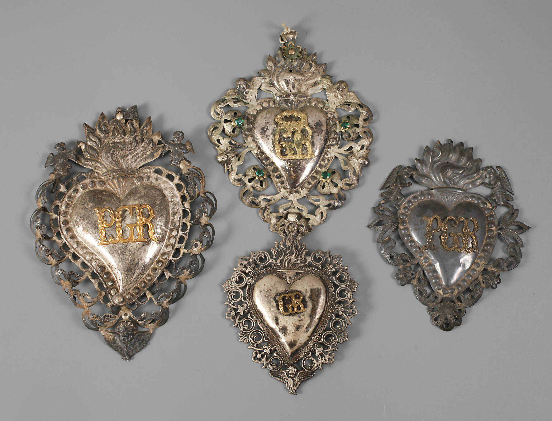 Vier Votivgaben Silber