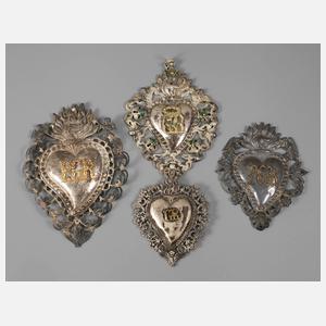 Vier Votivgaben Silber