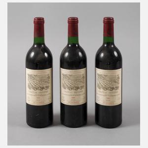 Drei Flaschen Rotwein