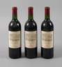 Drei Flaschen Rotwein