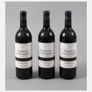 Drei Flaschen Rotwein