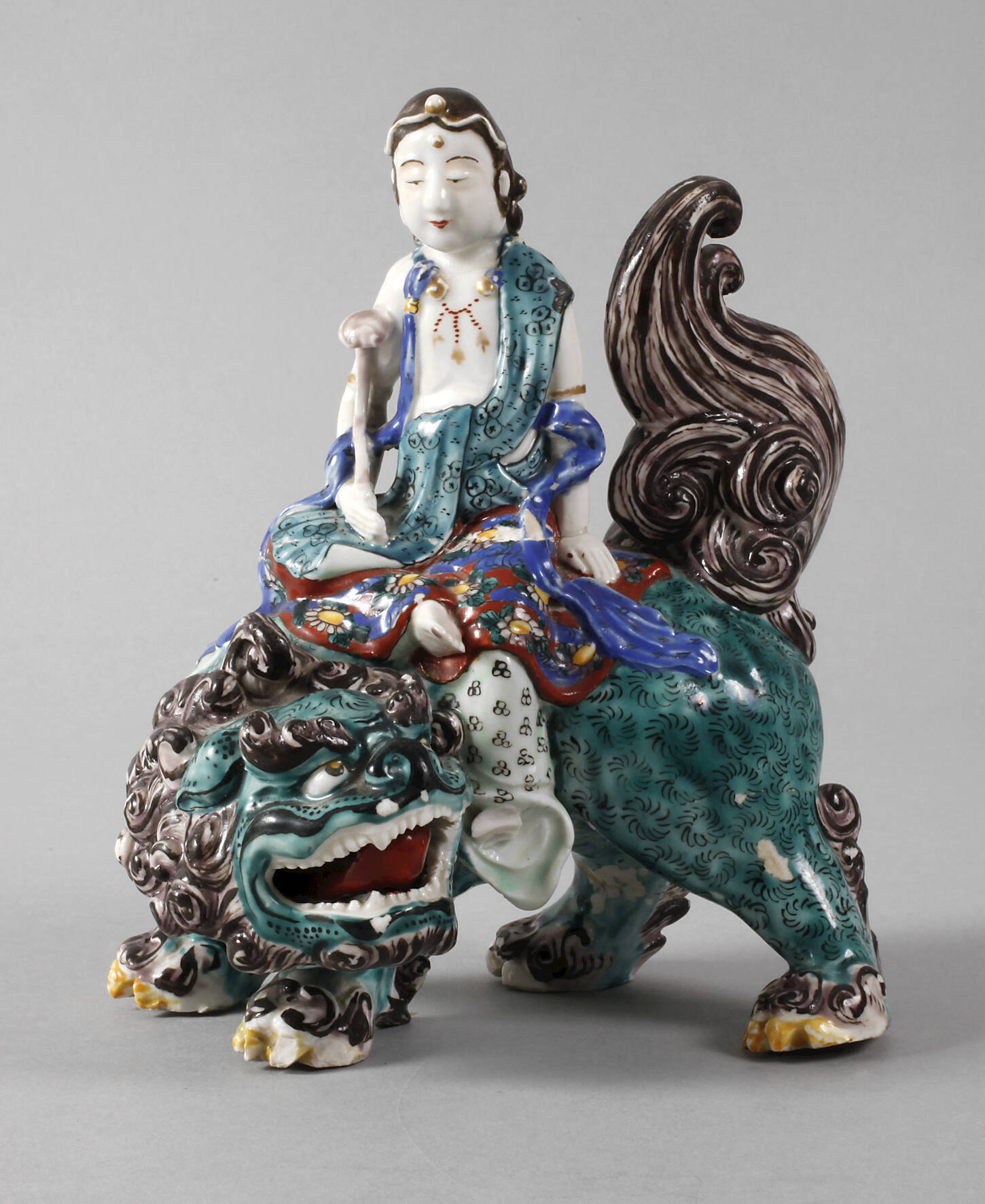 Porzellanfigur reitende Guanyin