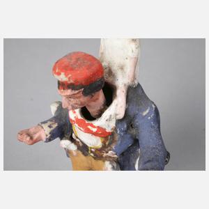 Wackelkopffigur als Puppenverkäufer