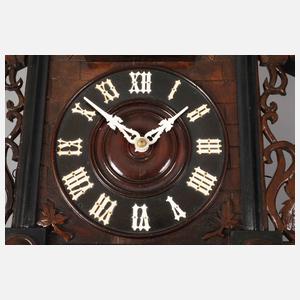 Kuckucksuhr mit Zitherspieler