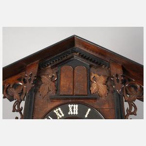 Kuckucksuhr mit Zitherspieler