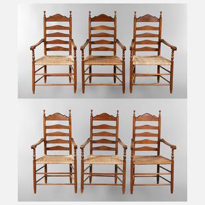 Sechs Armlehnstühle