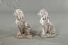 Steinguss zwei Hunde