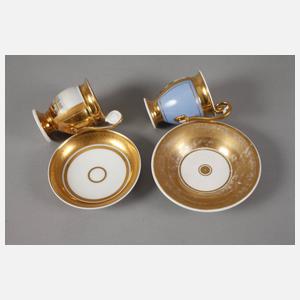 Zwei Sammeltassen mit Kauffahrteiszene