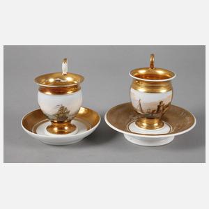 Zwei Sammeltassen mit Kauffahrteiszene