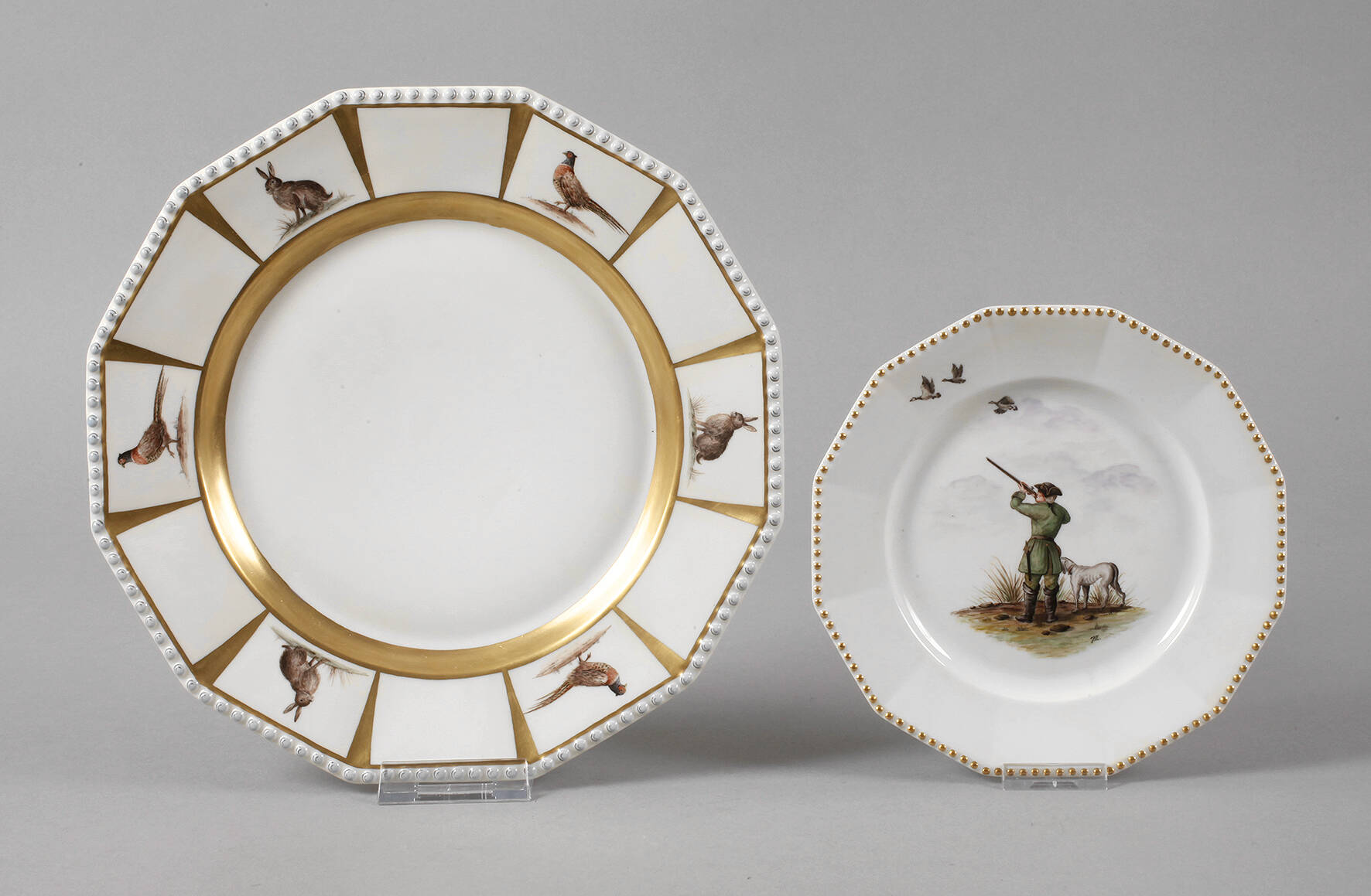 Nymphenburg zwei Teller mit Jagdmotiv