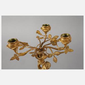 Paar Bronzeleuchter mit Putten