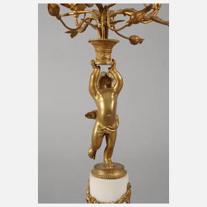 Paar Bronzeleuchter mit Putten