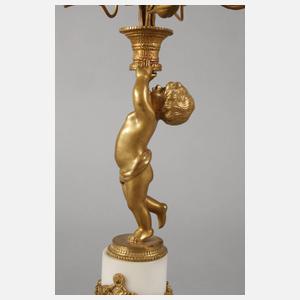 Paar Bronzeleuchter mit Putten