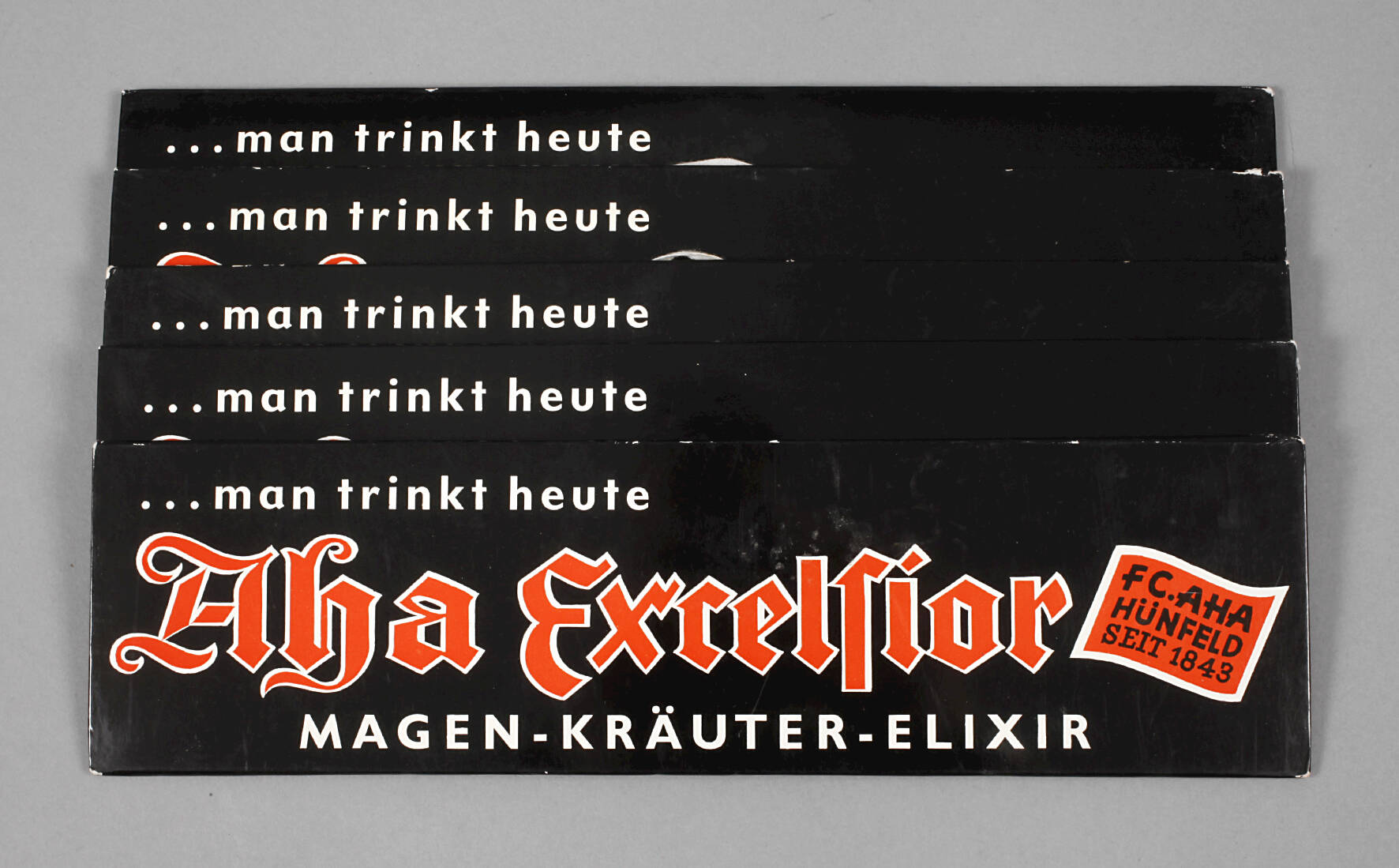 Fünf Werbeschilder Aha Excelsior