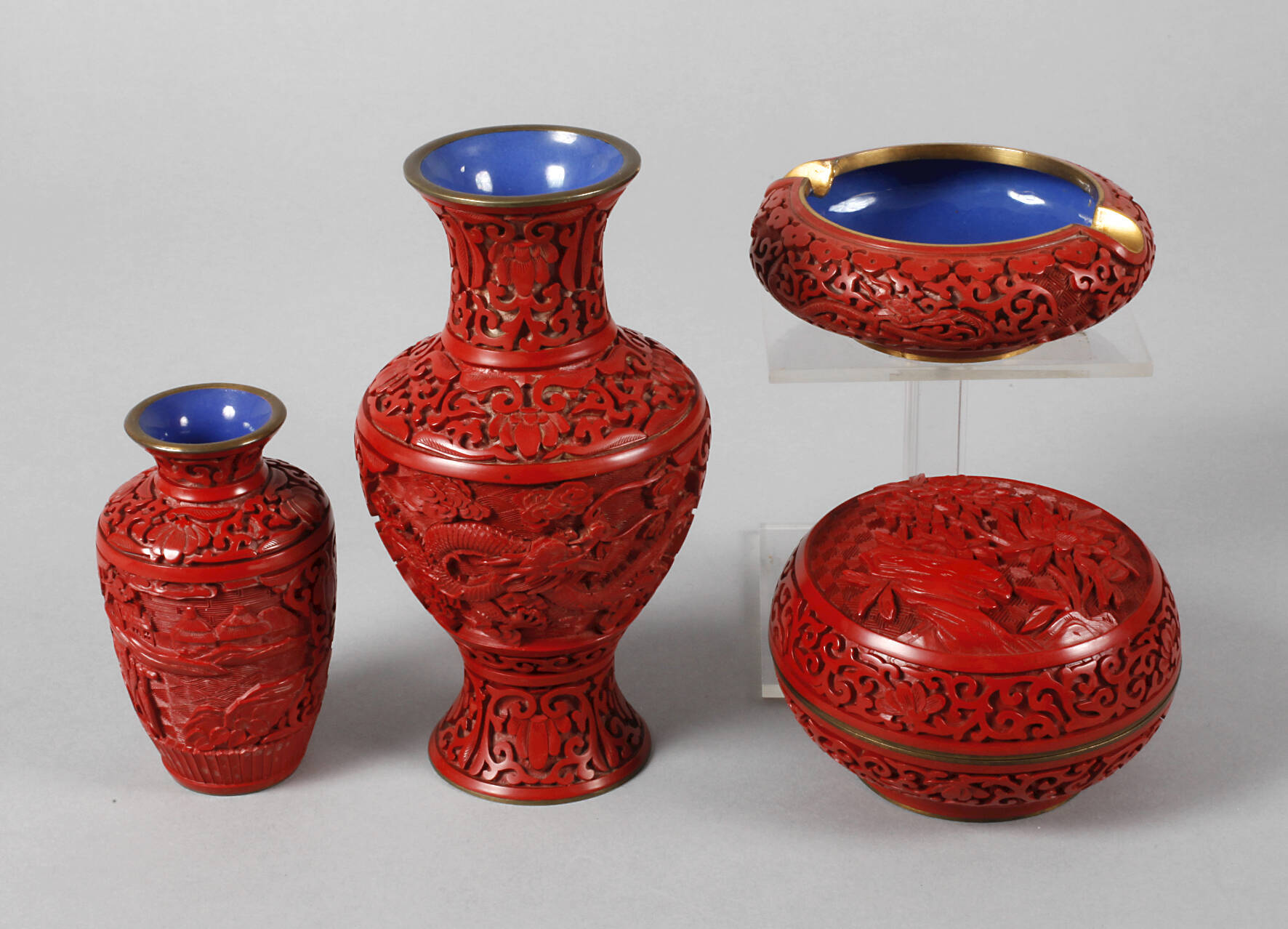 Vier Lackschnitzereien