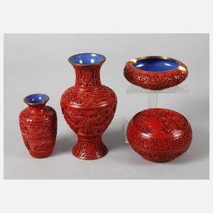 Vier Lackschnitzereien