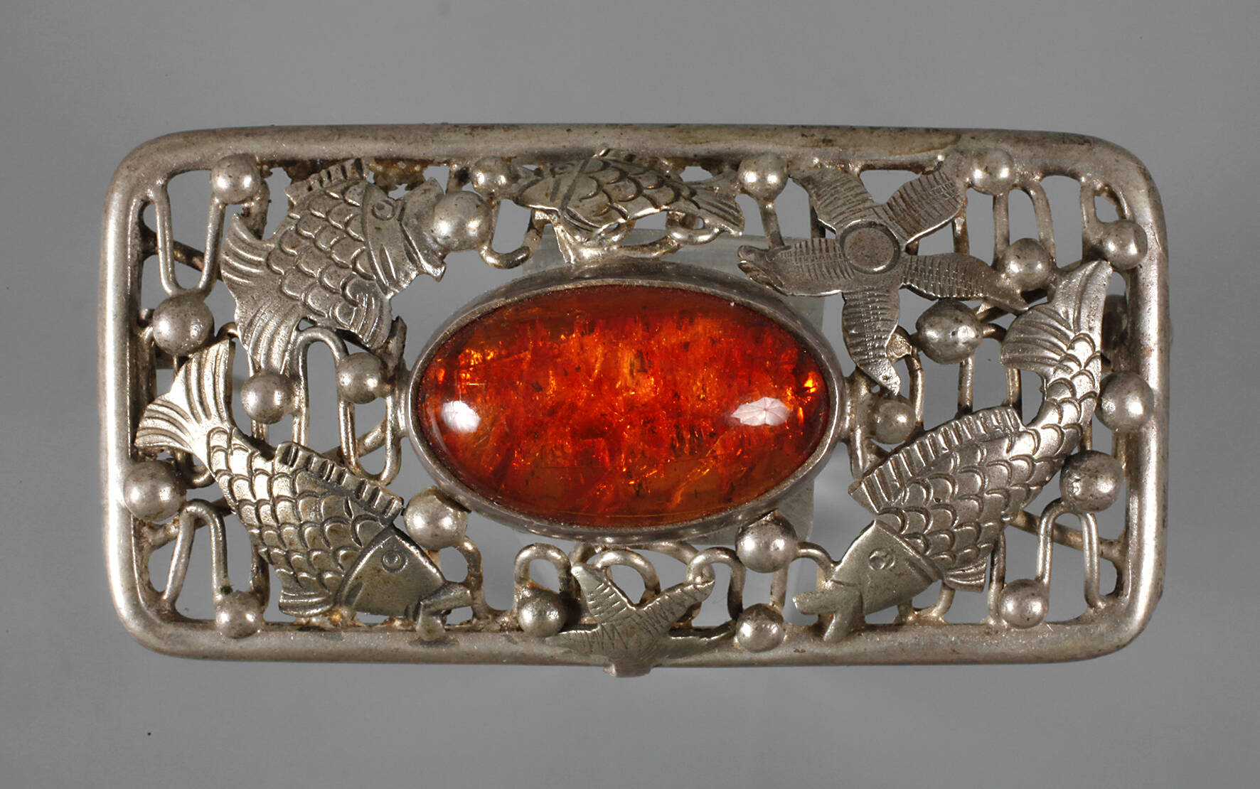 Georg Kramer Brosche mit Bernsteincabochon