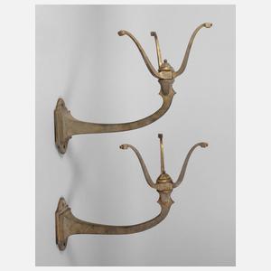 Paar Wandausleger Bronze