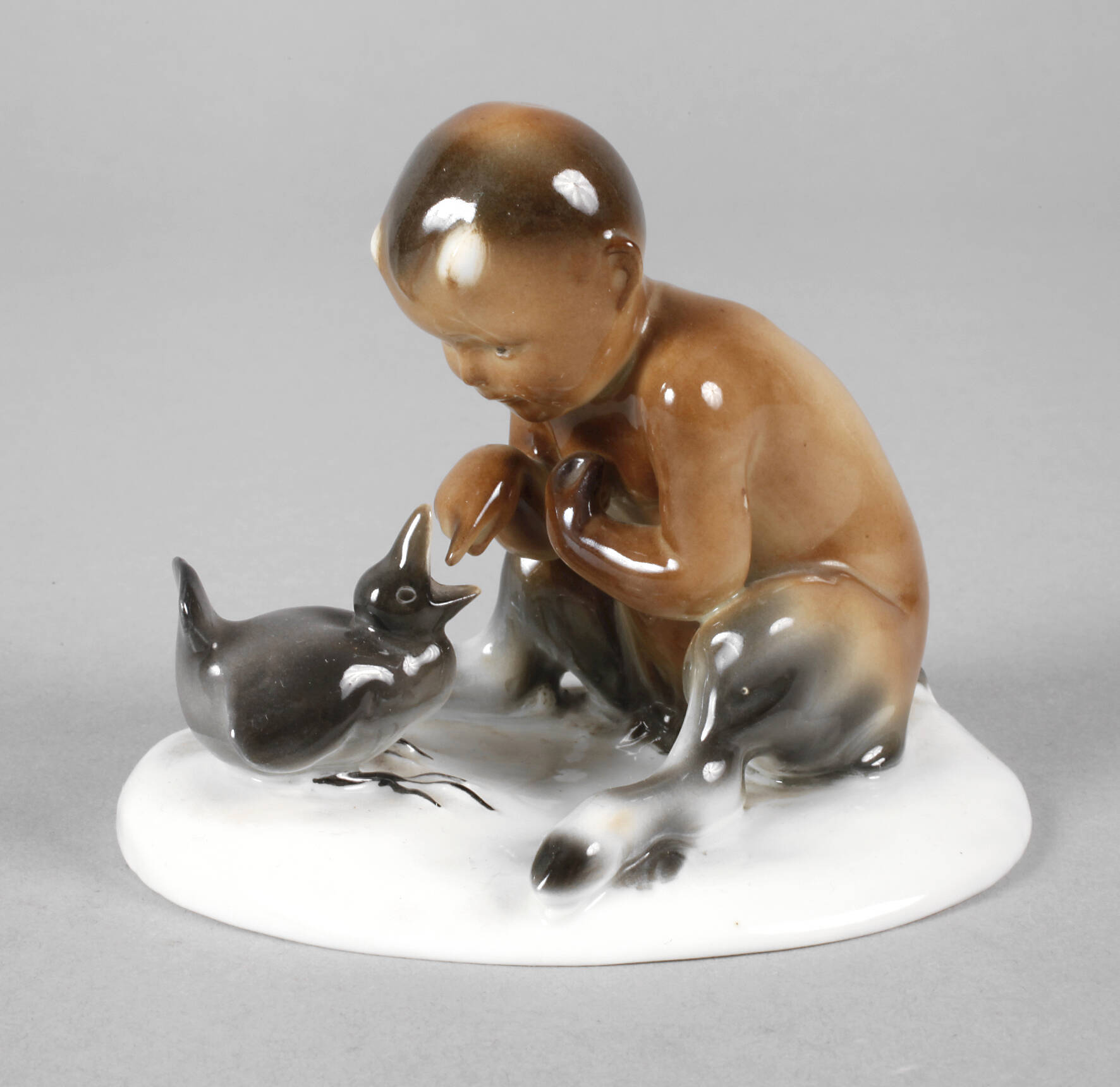 Goebel Faun mit Vogelküken