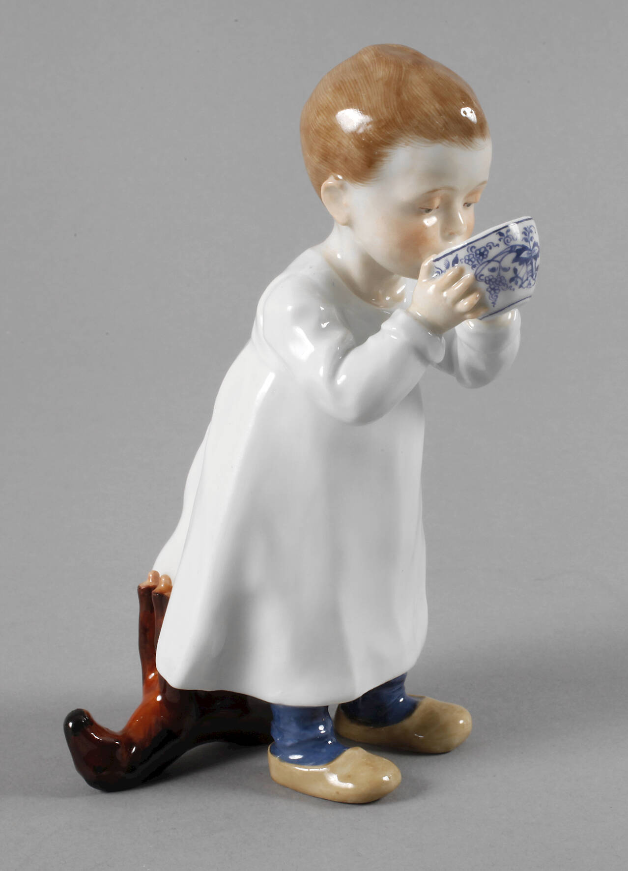 Meissen "Hentschelkind" mit Zwiebelmustertasse