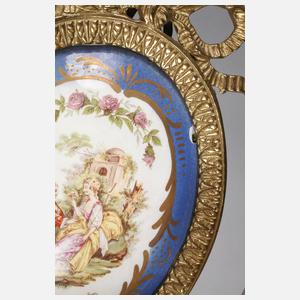 Paar Wandappliken mit Watteauszene